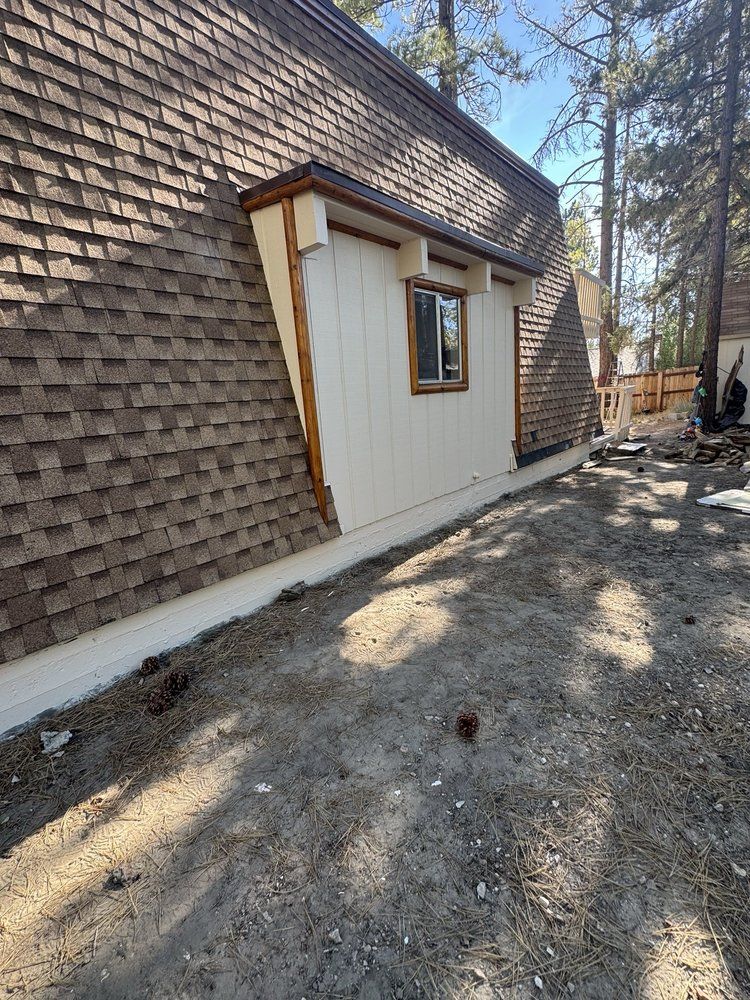 Cedar-shingle cabin exterior finished in Big Bear