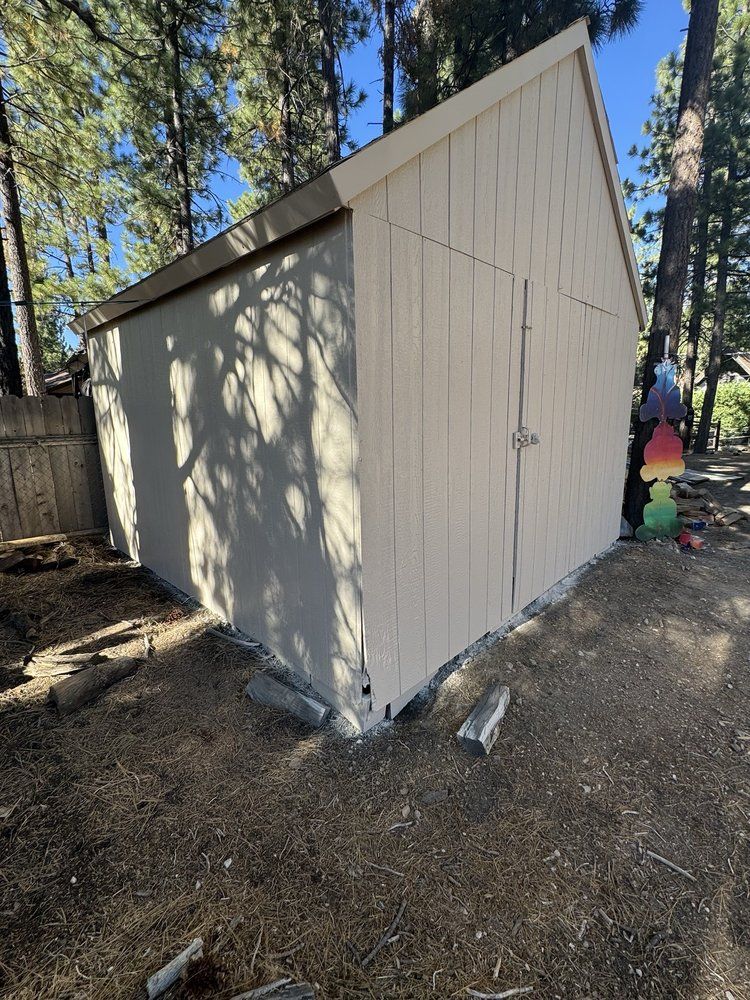 Painted shed or outbuilding matched to a Big Bear cabin