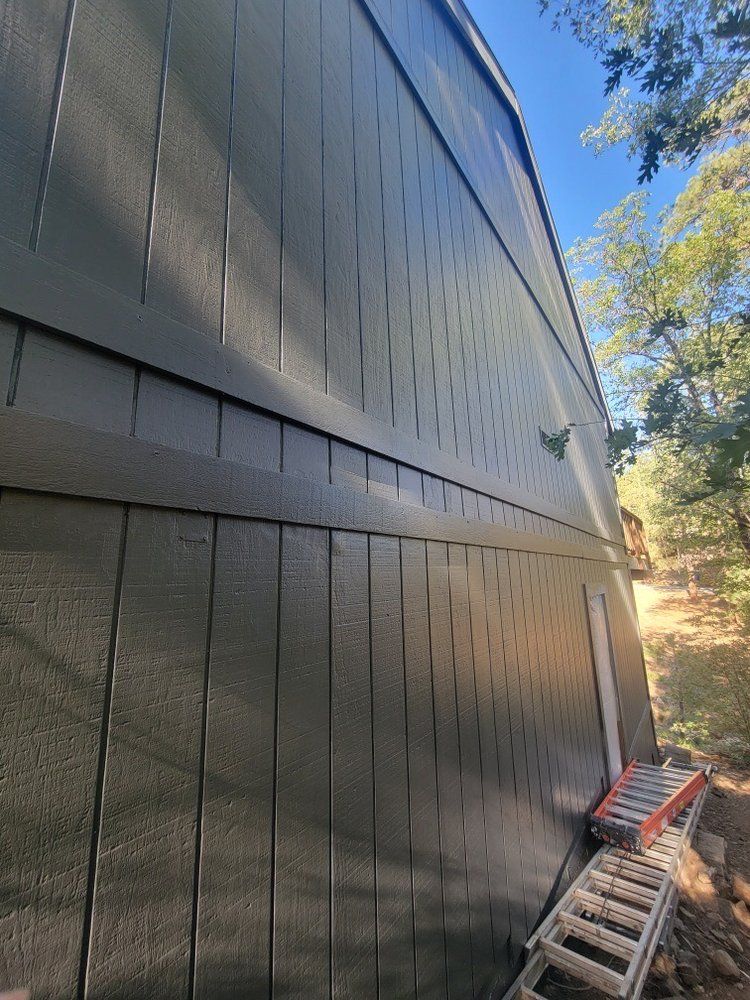 Close-up of freshly painted wood siding in Big Bear